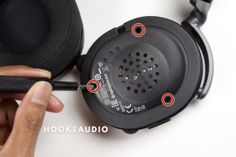 3. Remove the screws that keep the speaker in place to get access to the blown-out headphones' driver.