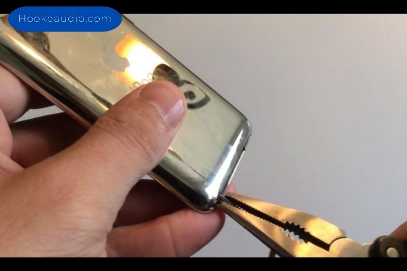 Remove a broken headphone jack Using a Ball Pen Tube