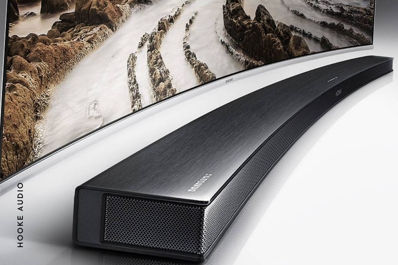 How do soundbars simulate surround effects without rear speakers
